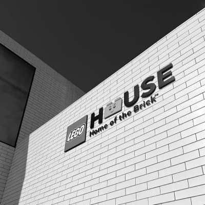 Photo of the LEGO House logo on a wall